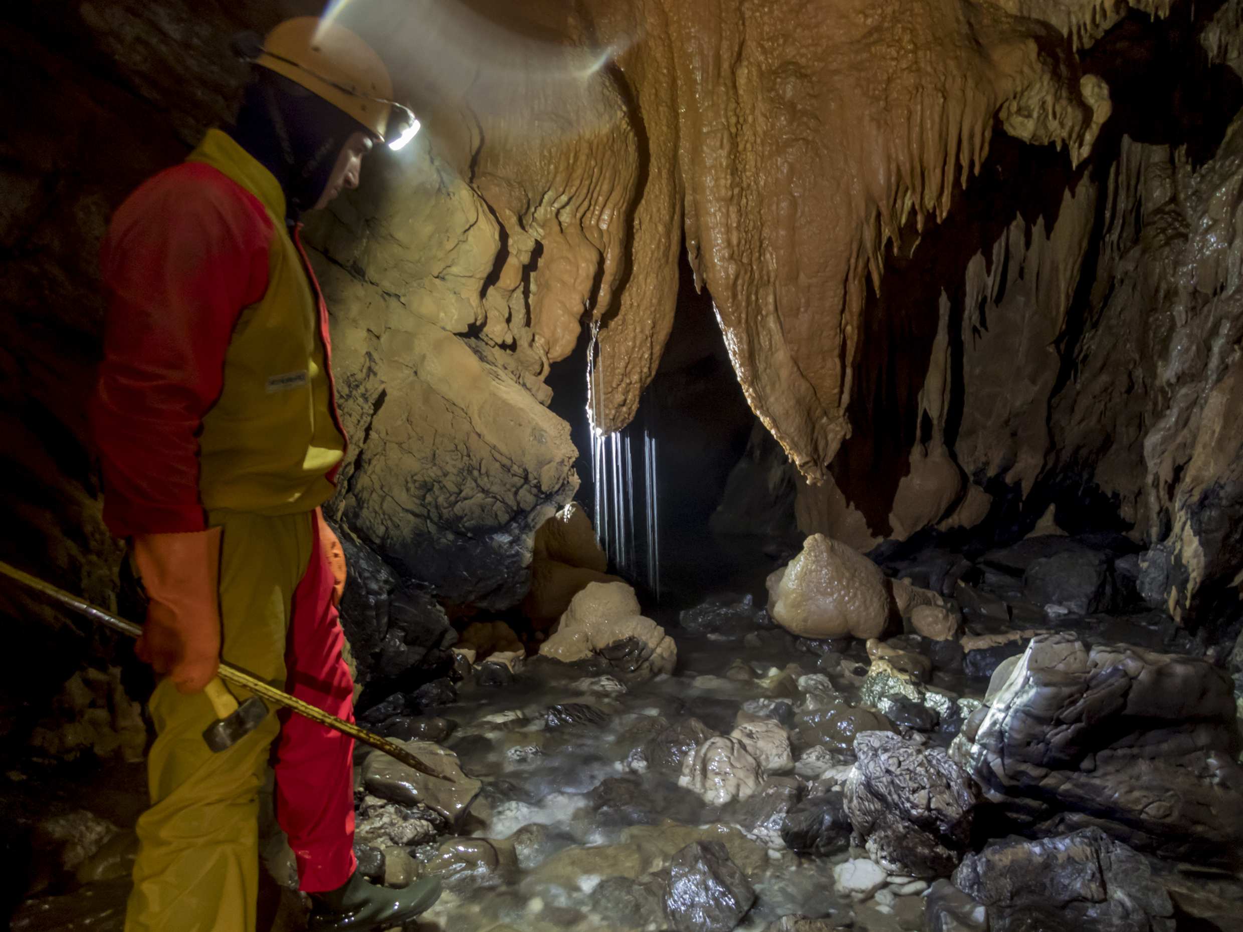 Caver and underground river