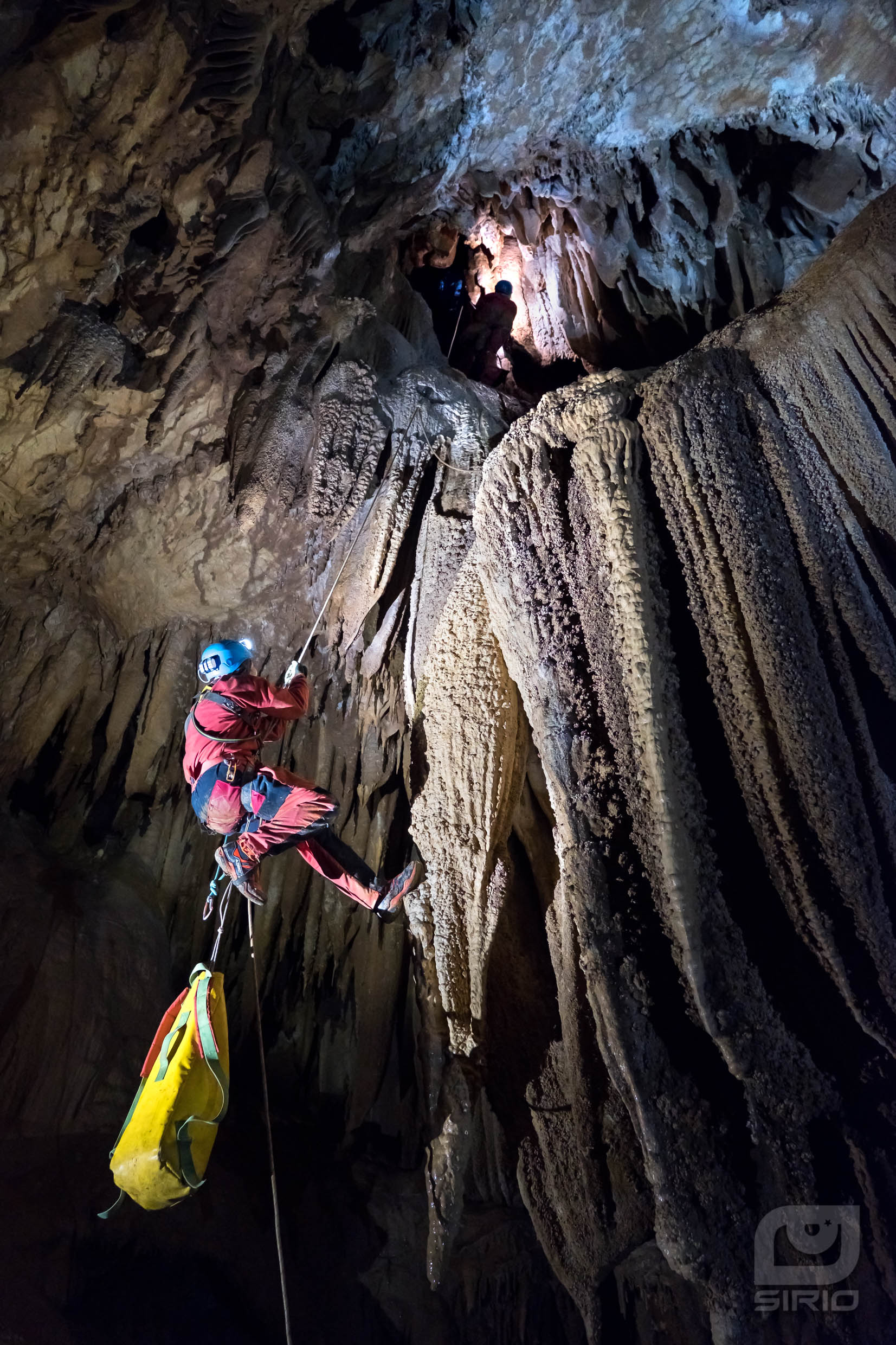 Cavers in shaft